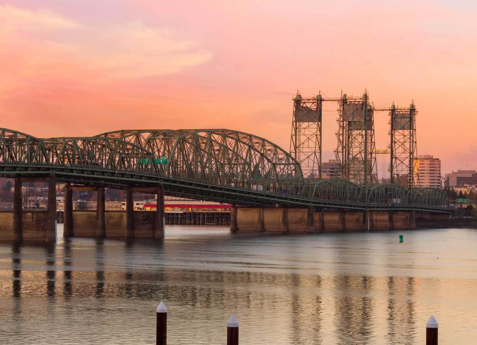 An industrial looking steel suspension bridge 